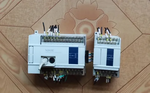 XINJE XC3-24R-E + XC-E2AD2PT2DA PLC Module product photo 1