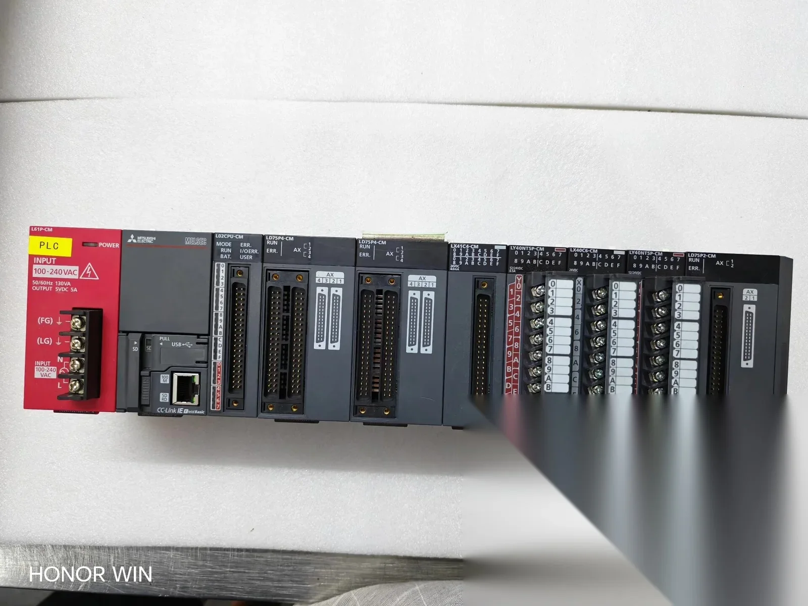 Mitsubishi Electric L61P-CM + L02CPU-CM + 2×LD75P4-CM + LX41C4-CM + 2×LY40NT5P-CM + LX40C6-CM + LD75P2-CM PLC Module product photo 1